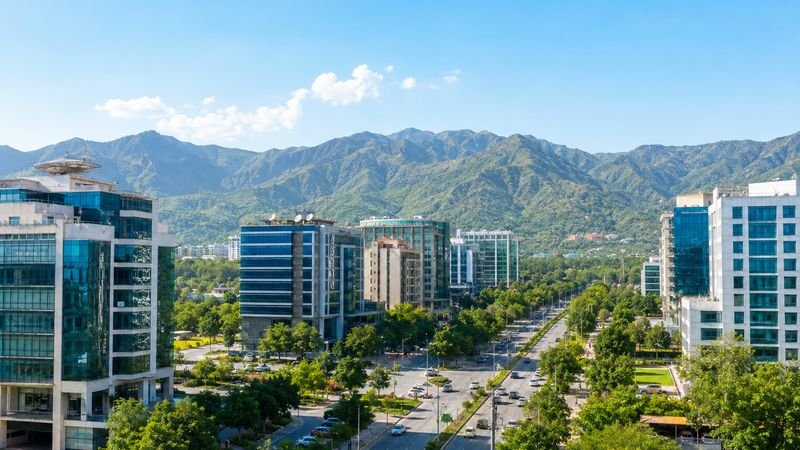 Blue Area business district in Islamabad with the Margalla Hills behind